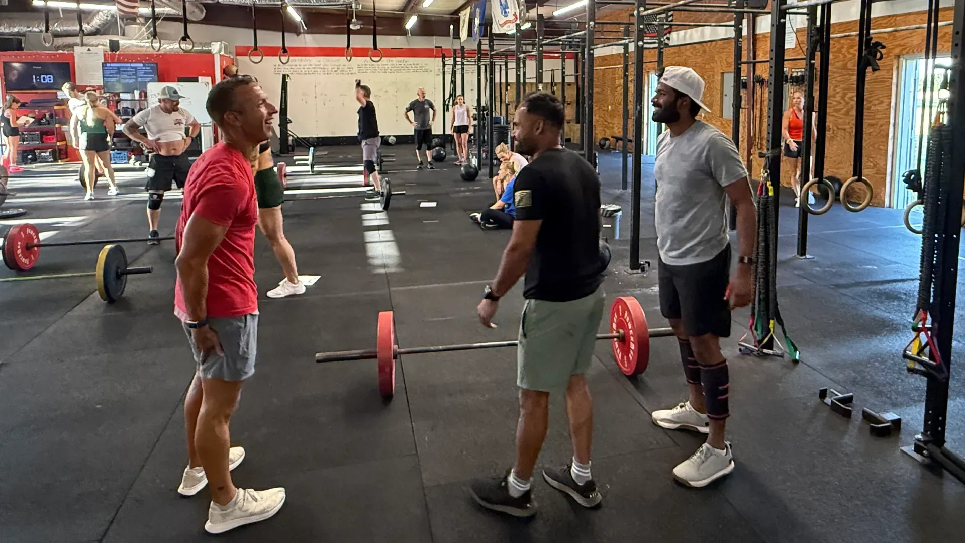 Coach working with athletes at CrossFit Northwest Arkansas